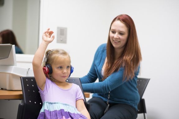 SLP student working with patient.