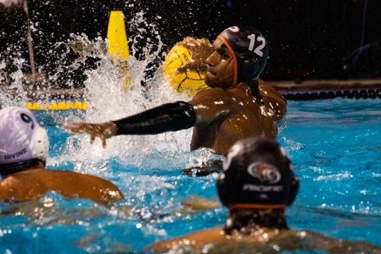 water polo players compete in a game