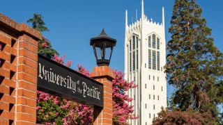 University of the Pacific sign with Burns Tower in the background