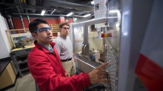 Students in a mechanical engineering lab. 