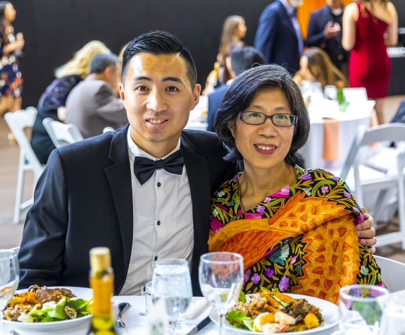 Mother and son at the annual Pharmacy Graduation Banquet