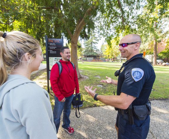 Officer speaking to students