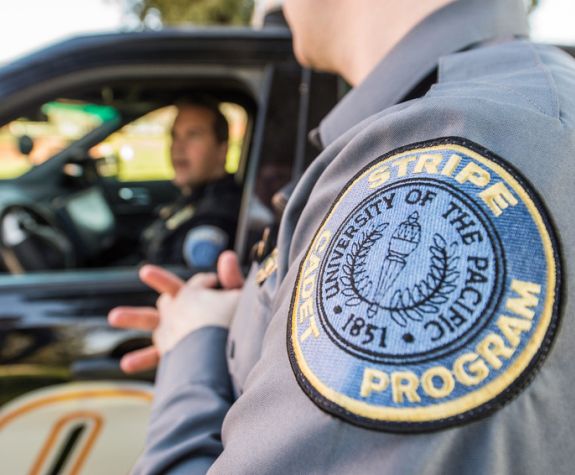 a STRIPE cadet talks to a public safety officer