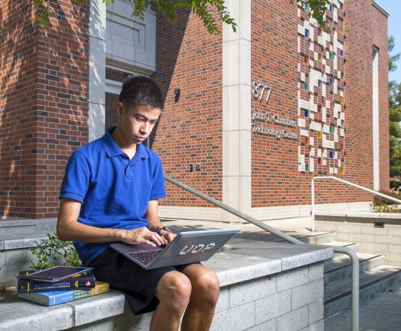 student using laptop
