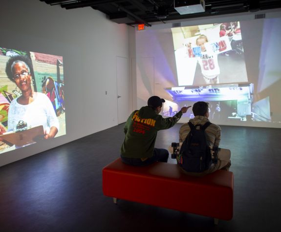 student reviews projected images