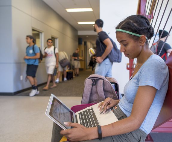 student using laptop