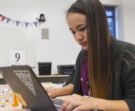 PharmD student on laptop