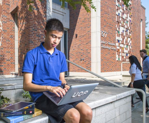 student working on laptop