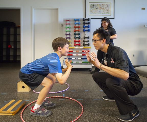 PT student working with child in clinic