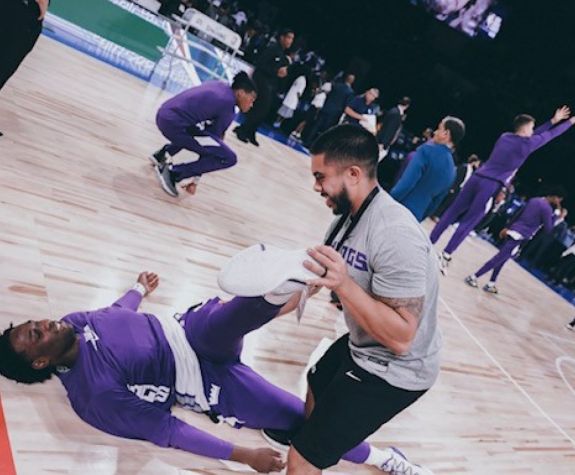 Ernie Delosangeles working with Sacramento Kings player