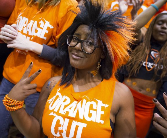 student celebrating at basketball game