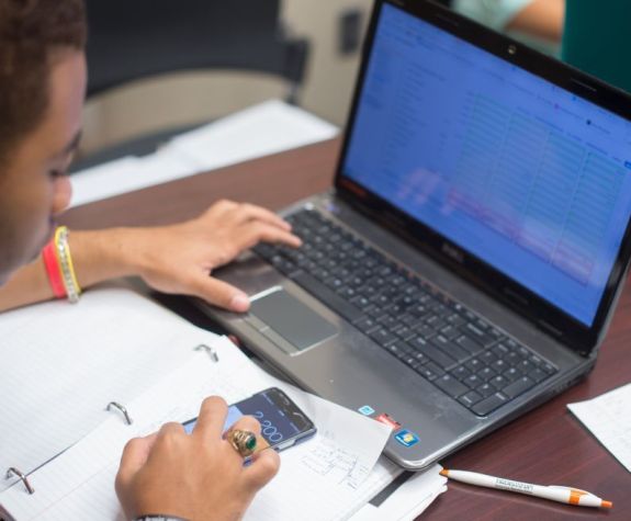 Student laptop calculator in class