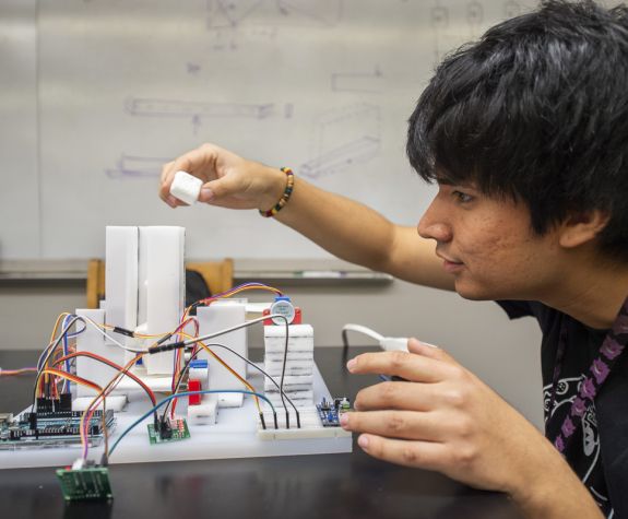 student working on senior project