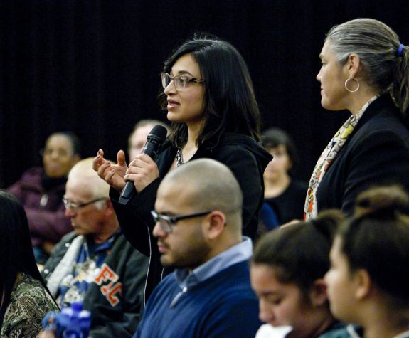 student at María Hinojosa lecture
