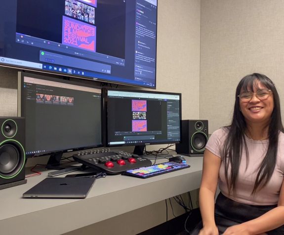 student working at editing bay
