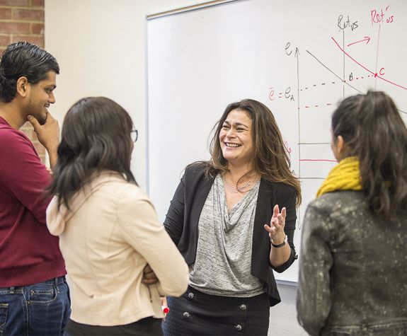the professor talking to students