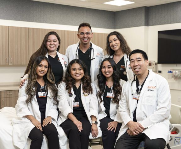 nursing students in white coats