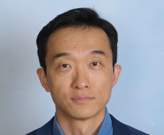 Image shows the face of UOP faculty member Dr. Long Wang.