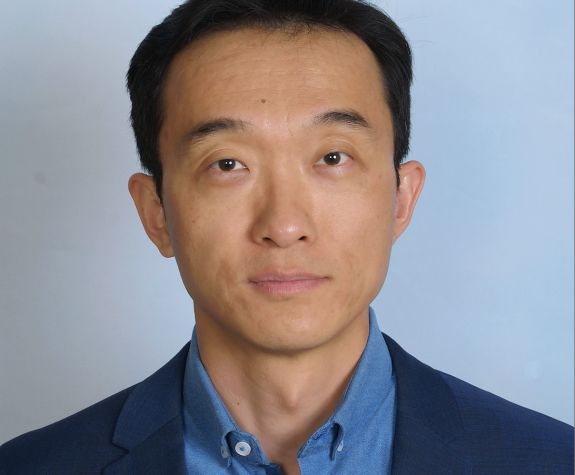 Image shows the face of UOP faculty member Dr. Long Wang.