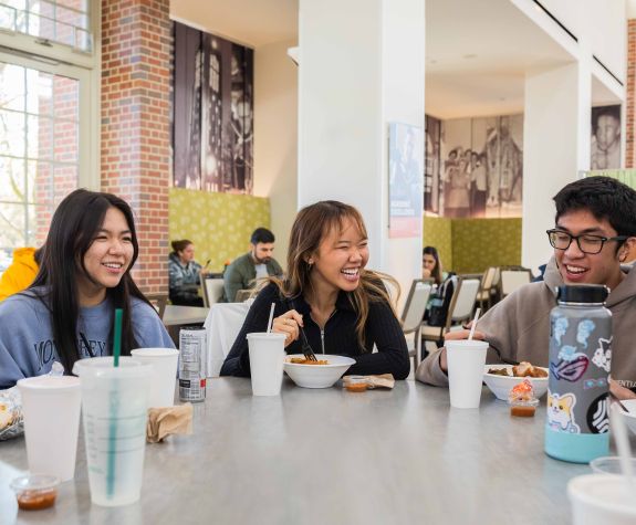 students enjoy lunch together