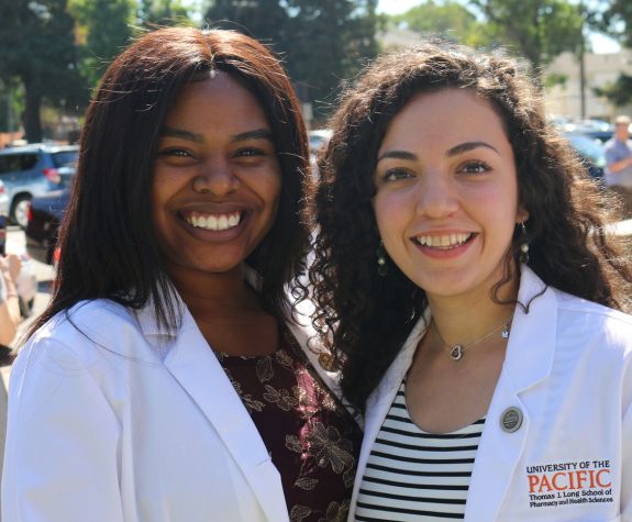 PharmD students in white coats