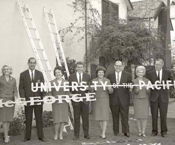 historic photo of people holding mcgeorge sign