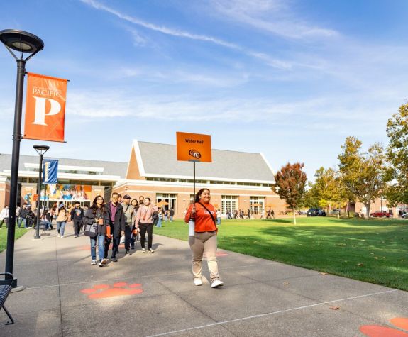 students walking in front of the derosa university center