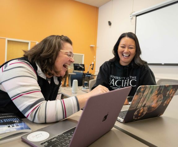 cohort members laughing together