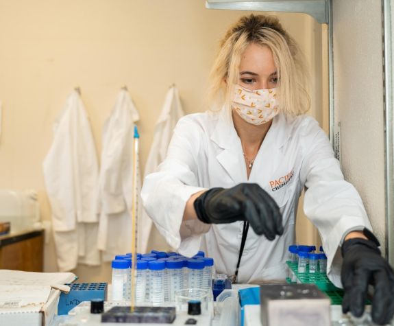 Student with vials
