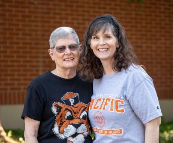 two ladies smiling