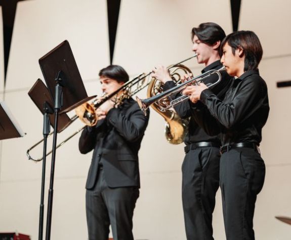 Students in a small horn ensemble