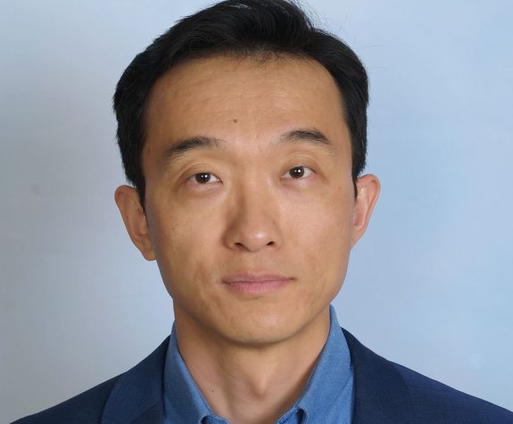 Image shows the face of UOP faculty member Dr. Long Wang.