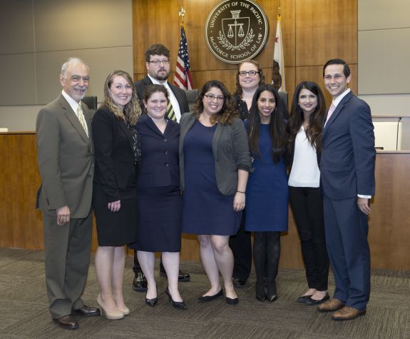 students and professor posing for a group photo