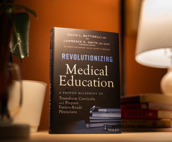 A stack of books on a desk