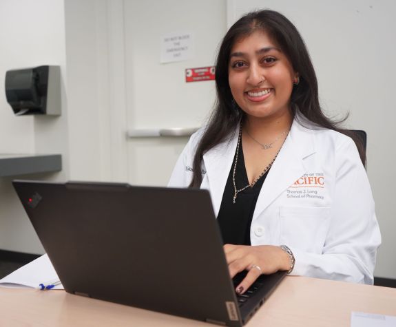 A student working on a laptop