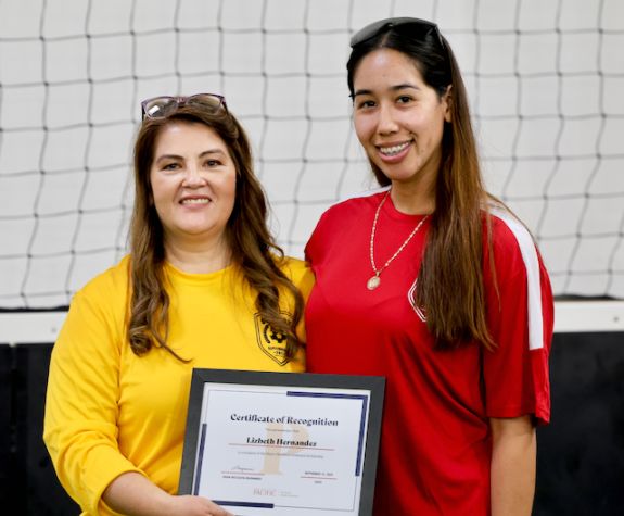 Photo shows the Dean presenting her 2025 nutrition scholarship.