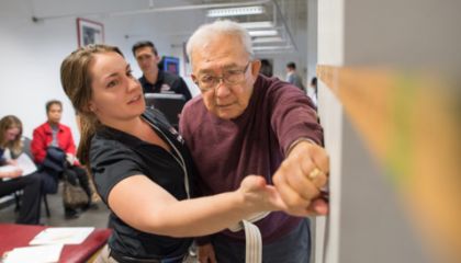 a student working with a patient