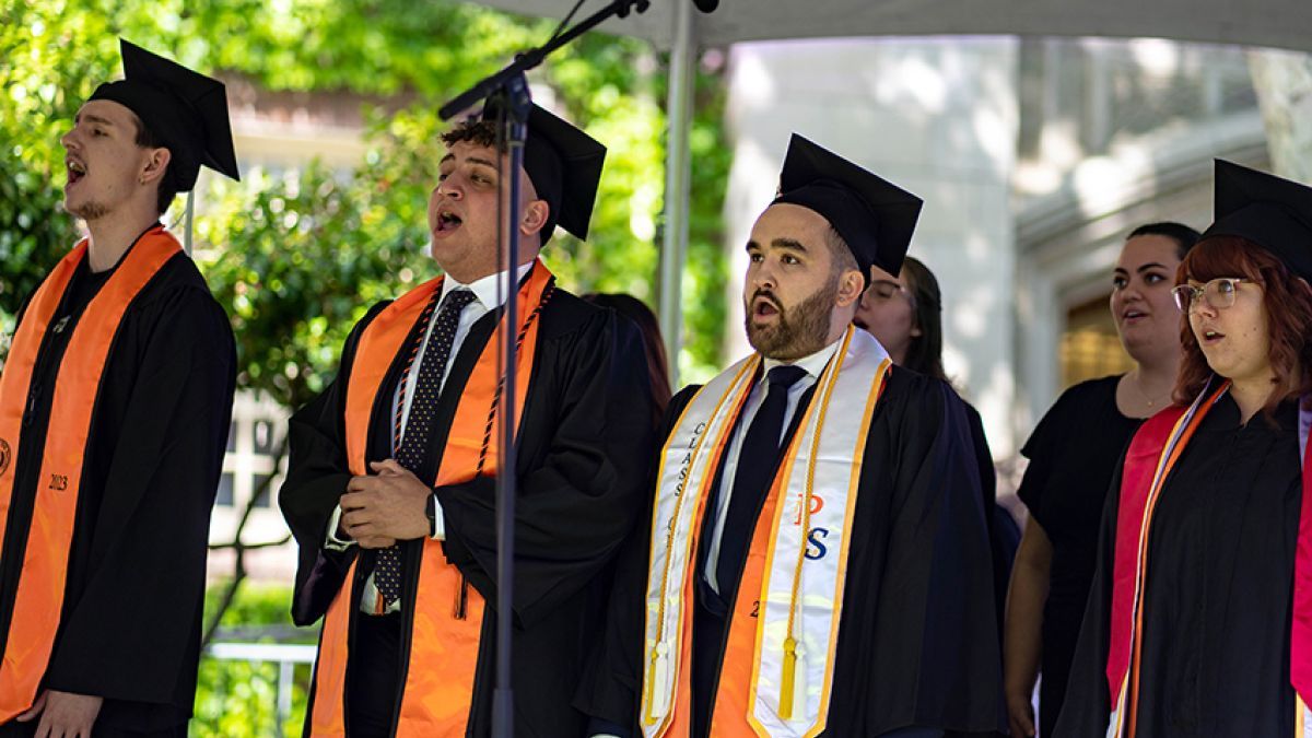 Filo singing at his own commencement ceremony