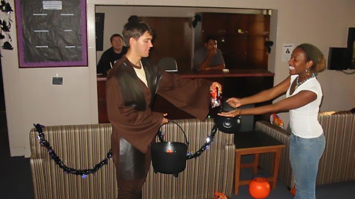 Two students participate in Halloween activities in Southwest Hall.