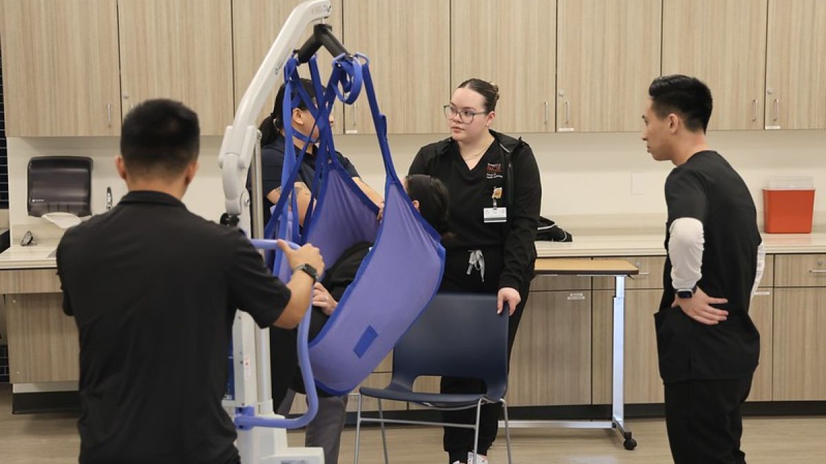 SHS students are shown learning how to use a patient lift