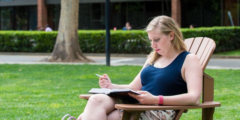 Student outside studying