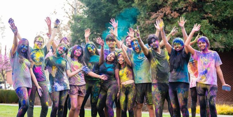 students celebrate holi