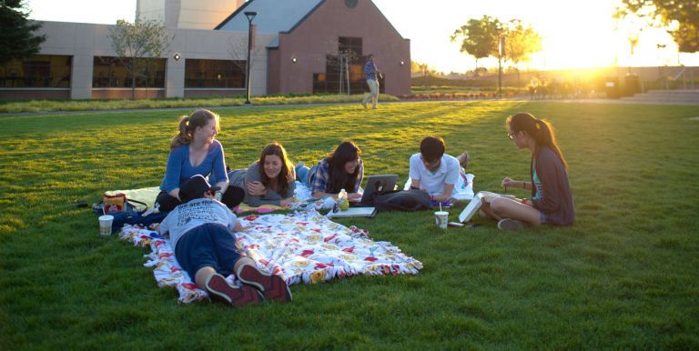 students sitting on DUC lawn