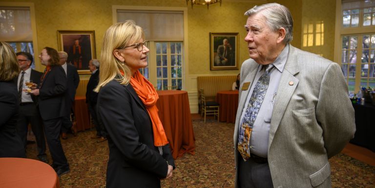 Jean Callahan with alumnus Dave Frederickson during reception at Anderson Hall