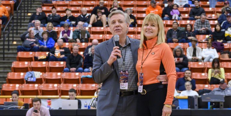 The Callahans at center court of the Alex G. Spanos Center during half-time of Dec. 4, 2019 men’s basketball game