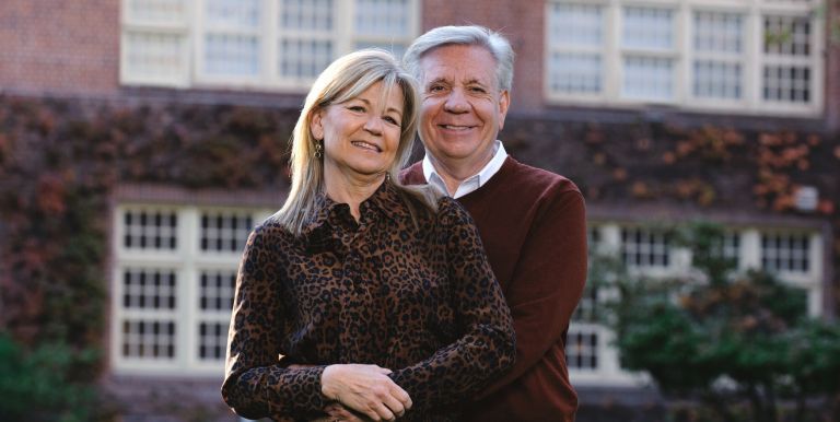 The Callahans in front of Knoles Hall
