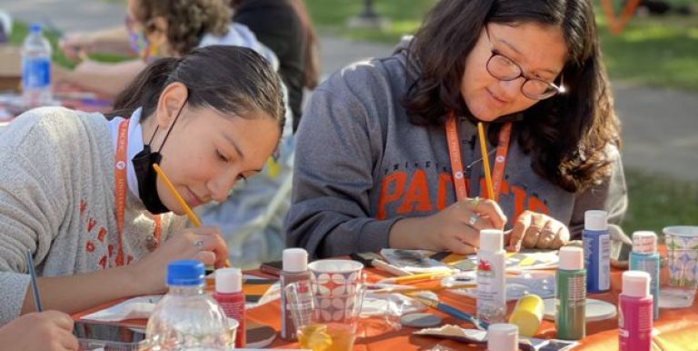 students painting