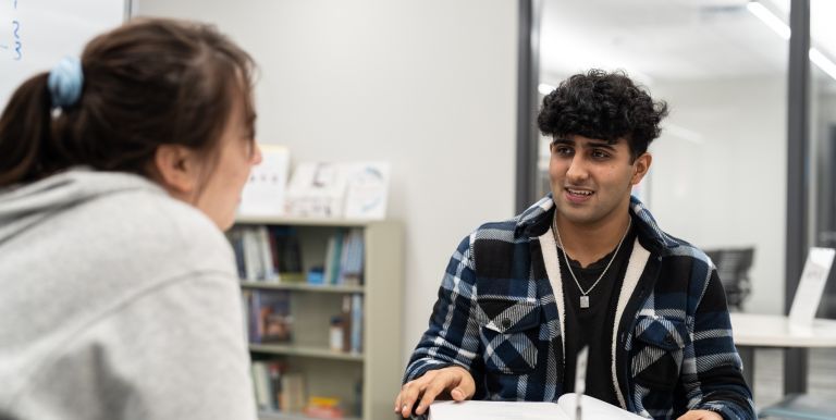 student tutoring another student