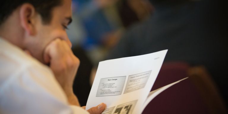 Person reviewing presentation slides