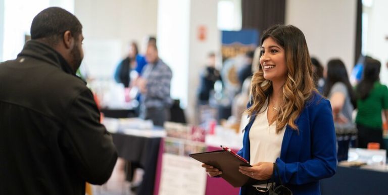 student at career services job fair